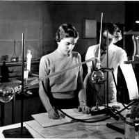 Chemistry distillation experiment, 1953. (Left to Right) unidentified student and Mrs. Bojan Jennings.