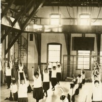 Students participating in calisthenics exercises, 1903.