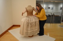 Camille Myers Breeze installing the The Costume of the Duchess du Choiseul Image courtesy of Hillary T. Shusterman