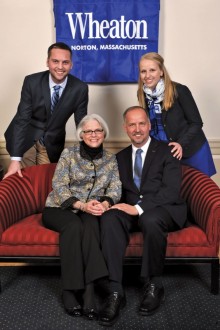 President Hanno sitting in the Office of Admission with his wife, Susan, their son, Ted, and daughter, Emily.