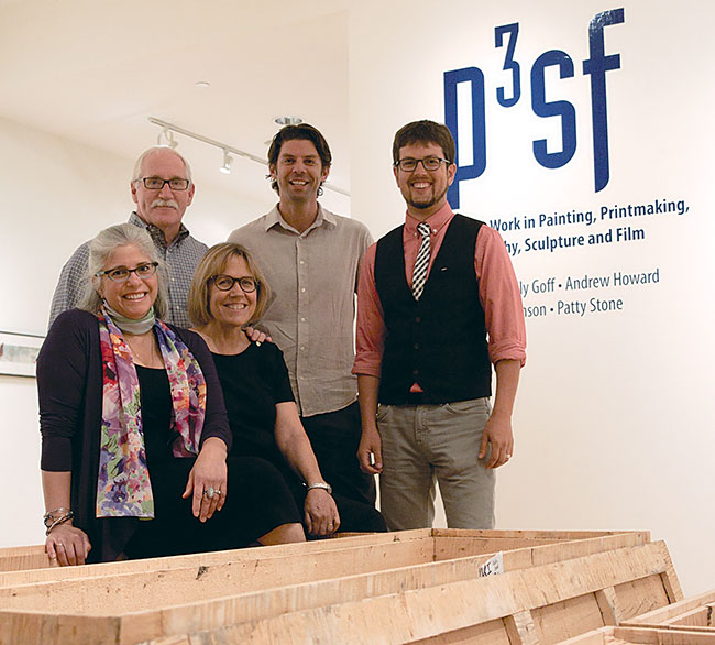 Professors Claudia Fieo, Patricia Stone (front row, left to right) and Andy Howard, Kelly Goff and Patrick Johnson (back row, left to right) at the faculty art exhibition opening reception