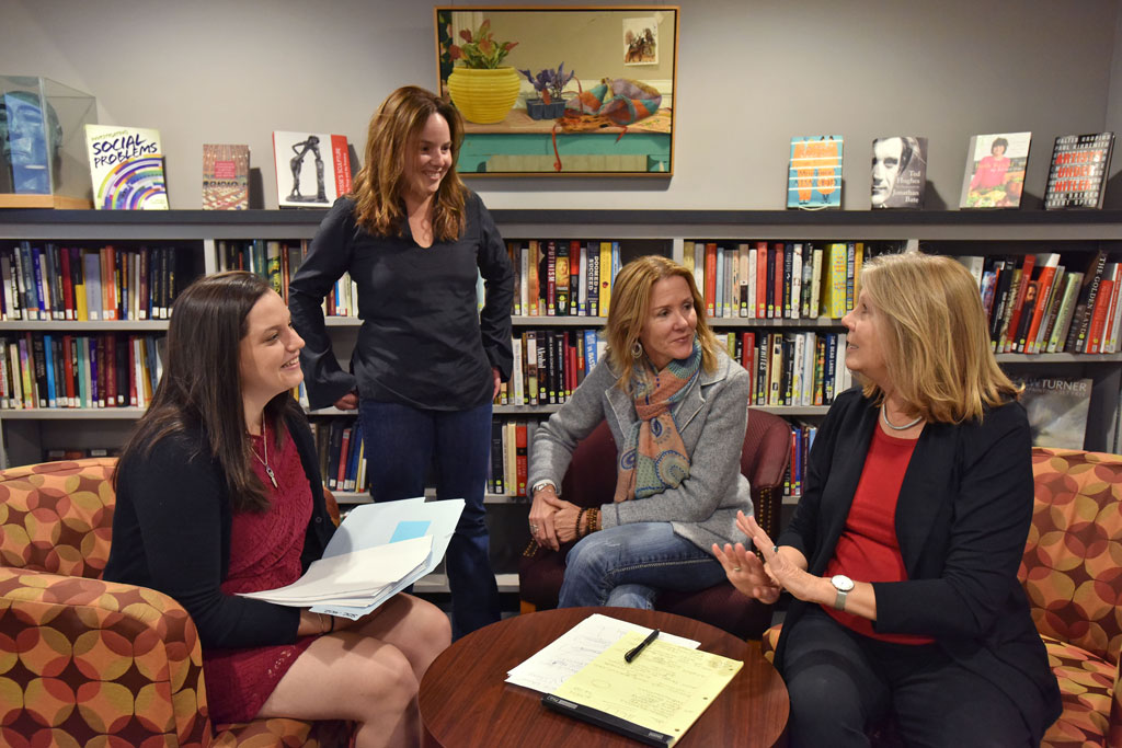 Jessica Kruger '17 helped professors (left to right) Gabriela Torres, Mary Beth Tierney-Tello and Kersti Yllo prepare their books for publication.