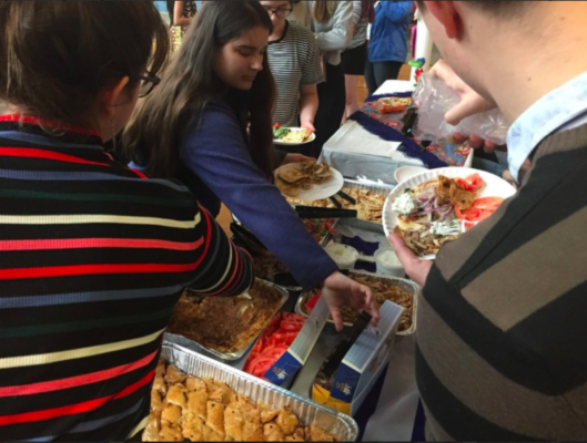 Students are serving homecooked food from their home countries