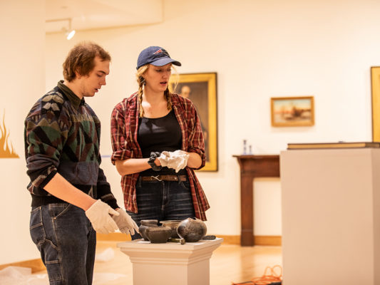 Student curators install "It's Elemental: Fire