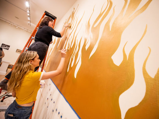 Student curators install "It's Elemental: Fire