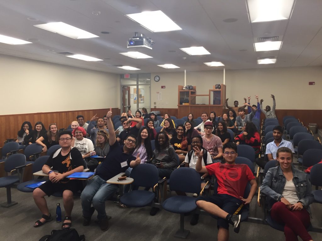 Here is a photo of the class of 2022. They are sitting in a classroom looking at the camera