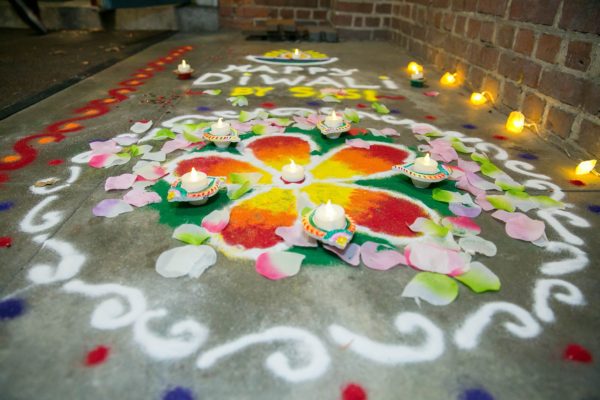 A beautifully hand drawn flowers with the words "diwali" inside it