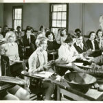 Archival photos of students in a classroom