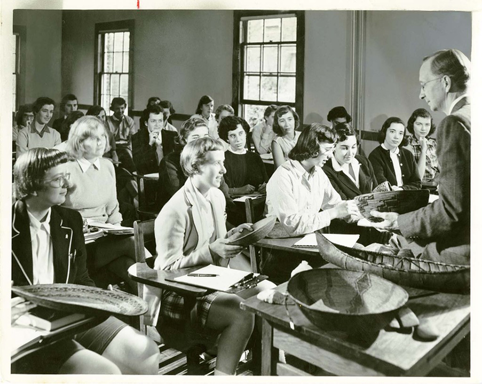 Archival photos of students in a classroom