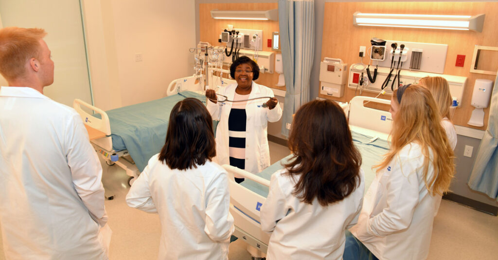 Dean of Nursing Colette Dieujuste with students
