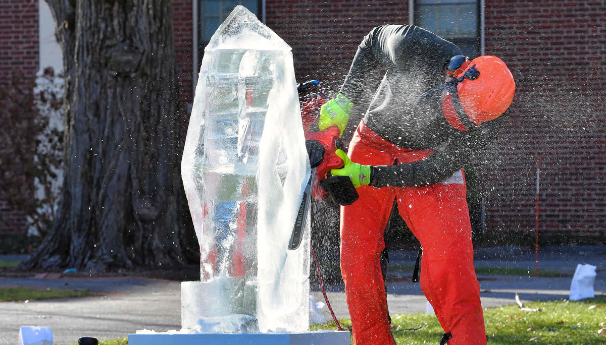 Matthew Cahill works on ice sculpture