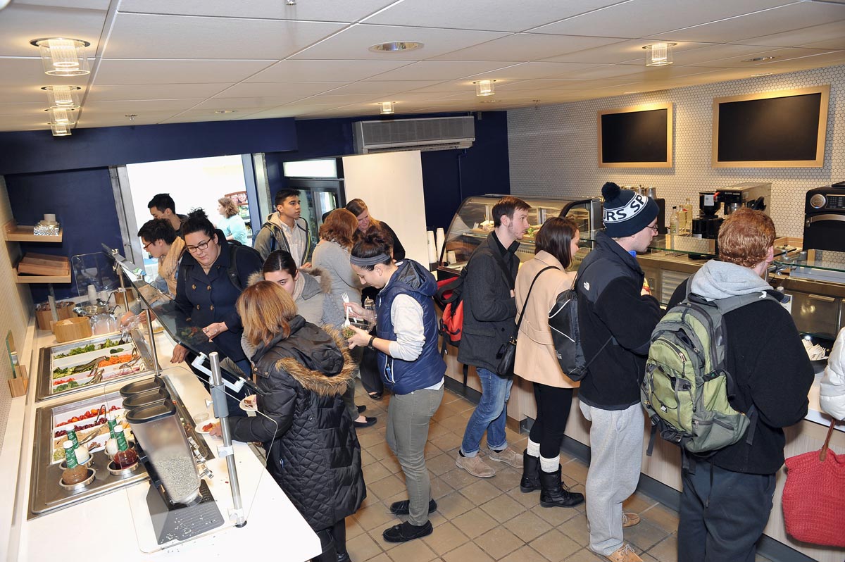 Students making food selections at Hood Eco Café