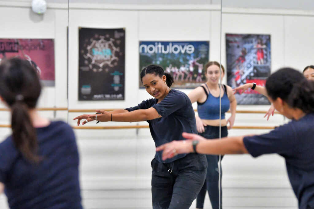 Izzi King ’22, a dancer with Urbanity Dance in Boston, works with members of the Wheaton College