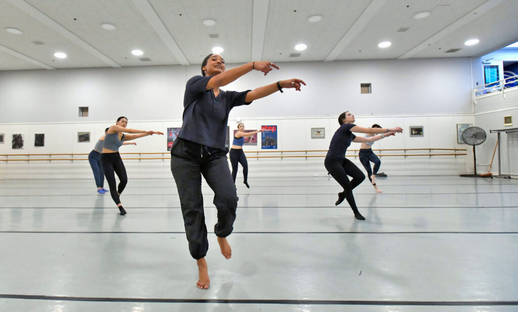 Izzi King ’22, a dancer with Urbanity Dance in Boston, works with members of the Wheaton College