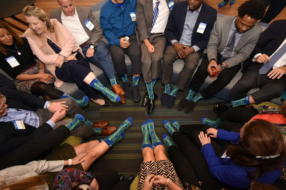 Group of students wearing Wheaton Fund socks