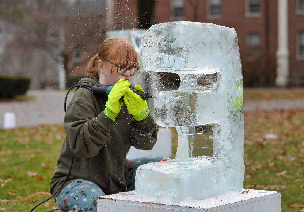Student making an ice sculpture at Winterfest 2023