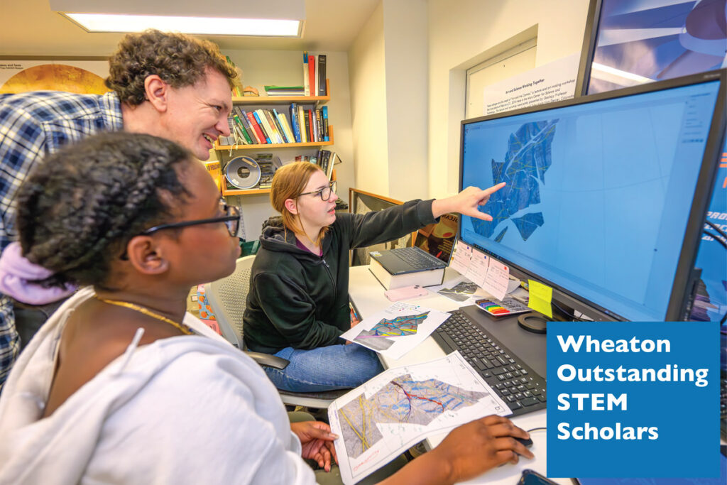 WOSS students analyzing a map of Jupiter’s moon Europa.